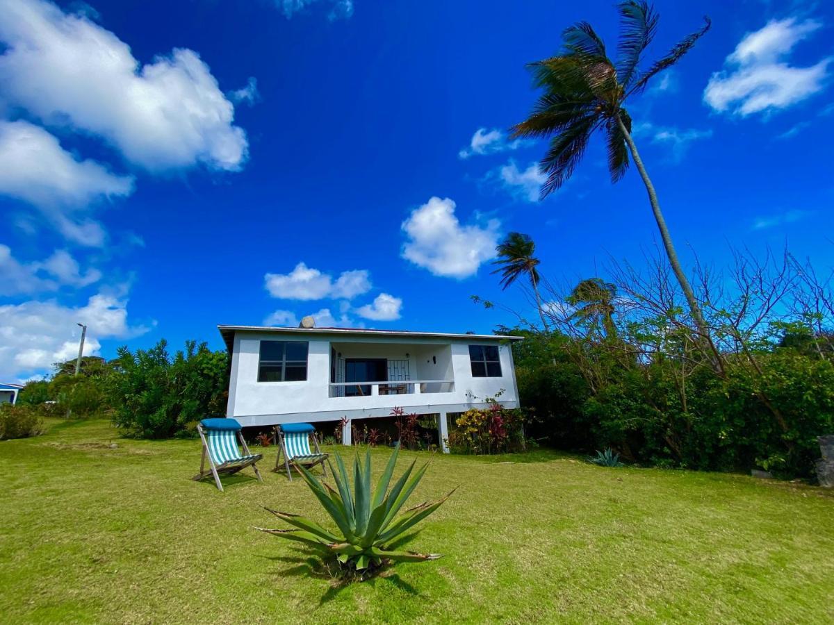 Sea Cliff Eco-Cottages & Gin Distillery Calibishie エクステリア 写真